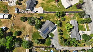 Aerial overview of property's location with nearby suburban area