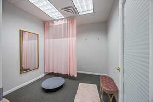 Miscellaneous room featuring a drop ceiling