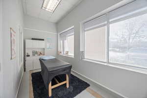 Home office featuring a drop ceiling