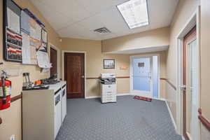 Kitchen featuring a drop ceiling
