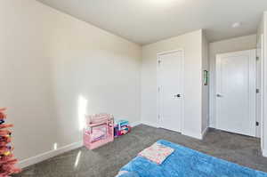 Unfurnished bedroom featuring carpet floors