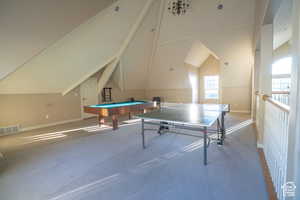 Recreation room featuring vaulted ceiling and pool table