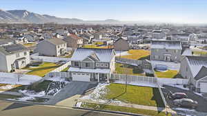 Aerial perspective of suburban area featuring mountains