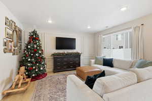 Living area with light wood-style floors