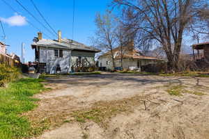 Rear view of house with a chimney