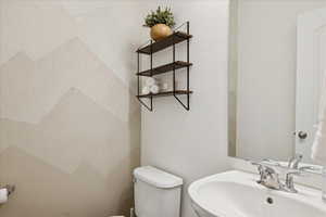 Bathroom with a sink and toilet