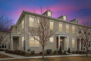 View of front of home with stucco siding