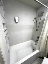Bathroom with shower / tub combo