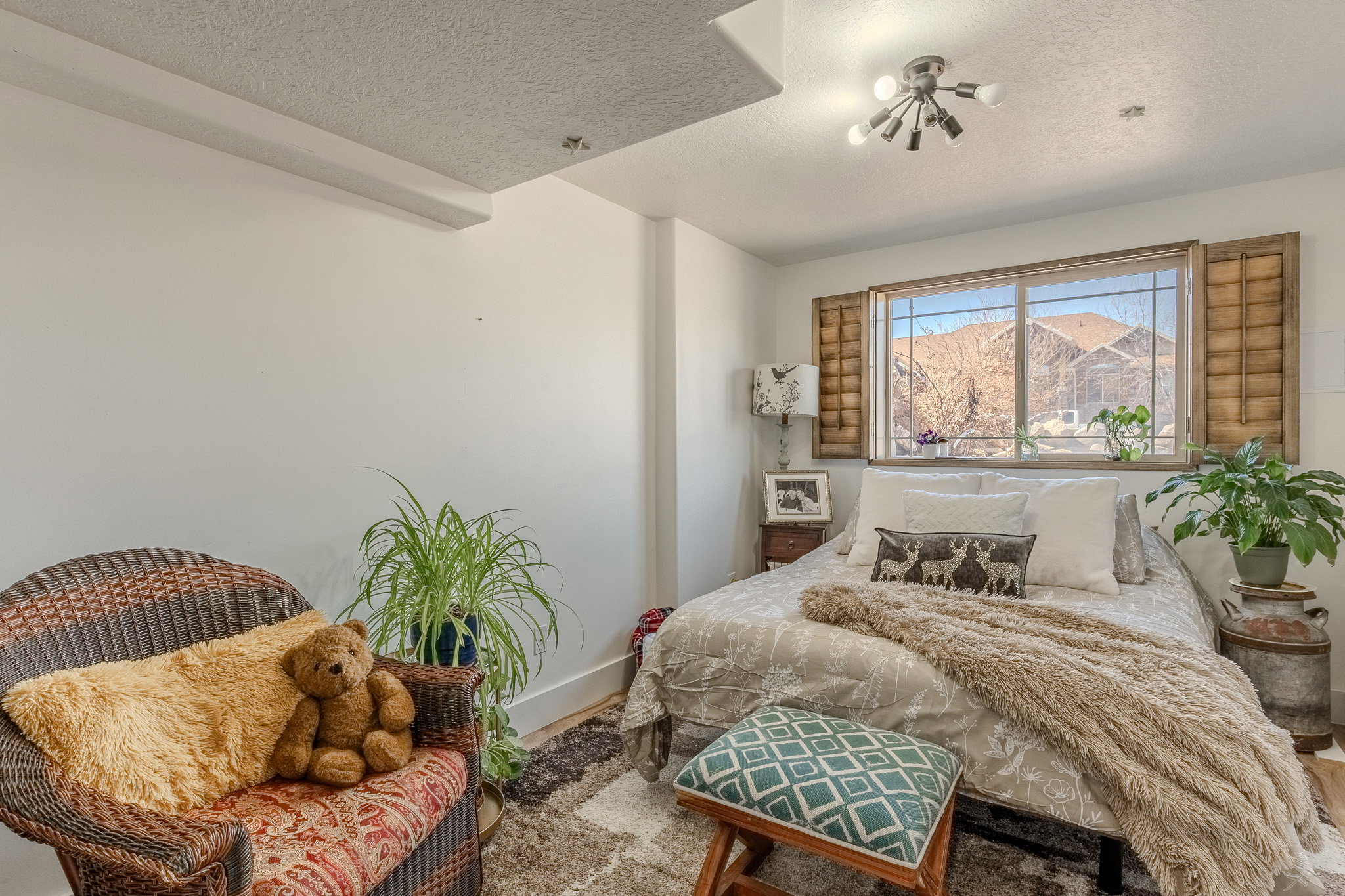 Bedroom with a textured ceiling