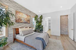 Owner's Suite with tons of natural light and beautiful upgraded accent stone wall