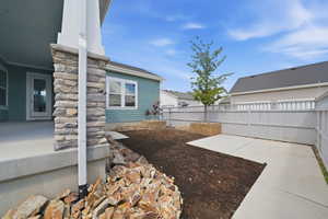 Backyard with a cement patio