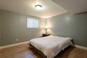 Bedroom featuring hardwood / wood-style flooring