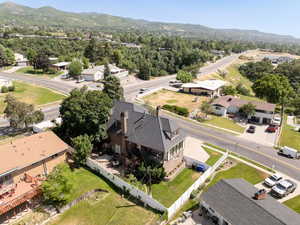 Aerial perspective of suburban area featuring a mountainous background