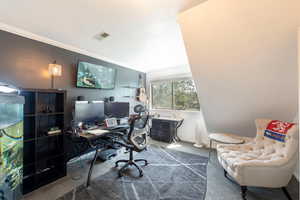 Office with carpet and crown molding