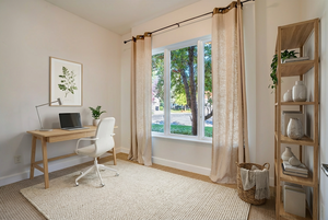 Office with baseboards and carpet floors