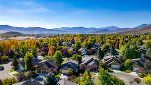 Aerial view of residential area featuring a mountain backdrop