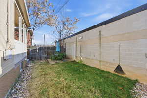 View of fenced backyard
