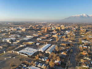 View of property location featuring nearby urban area and a mountainous background