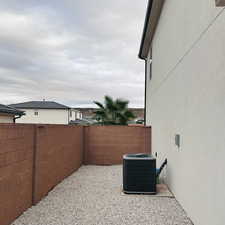 View of fenced backyard