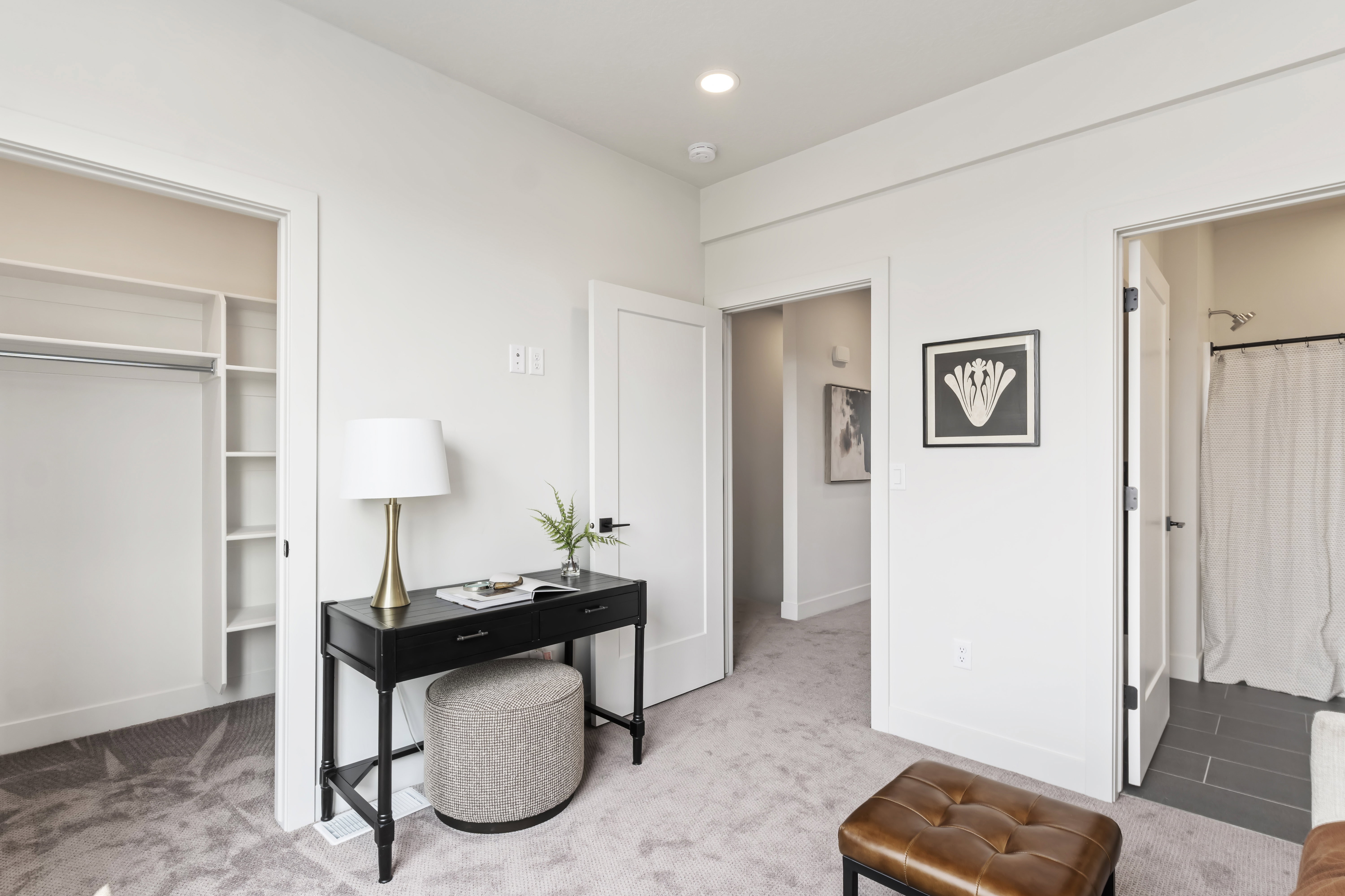 Office space with light colored carpet and recessed lighting Model Home