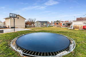 View of yard featuring a patio area and a residential view
