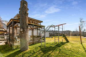 View of yard featuring a playground