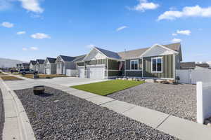 Ranch-style home featuring 3 car garage and RV parking