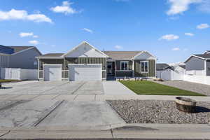 Ranch-style home featuring 3 car garage and RV parking