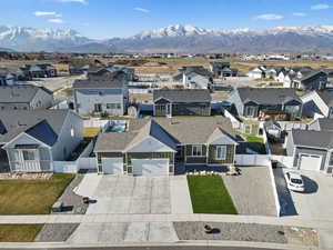 Aerial view of residential area with a mountainous background