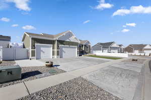 Ranch-style home featuring 3 car garage and RV parking