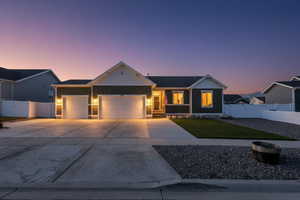 Ranch-style home featuring 3 car garage and RV parking