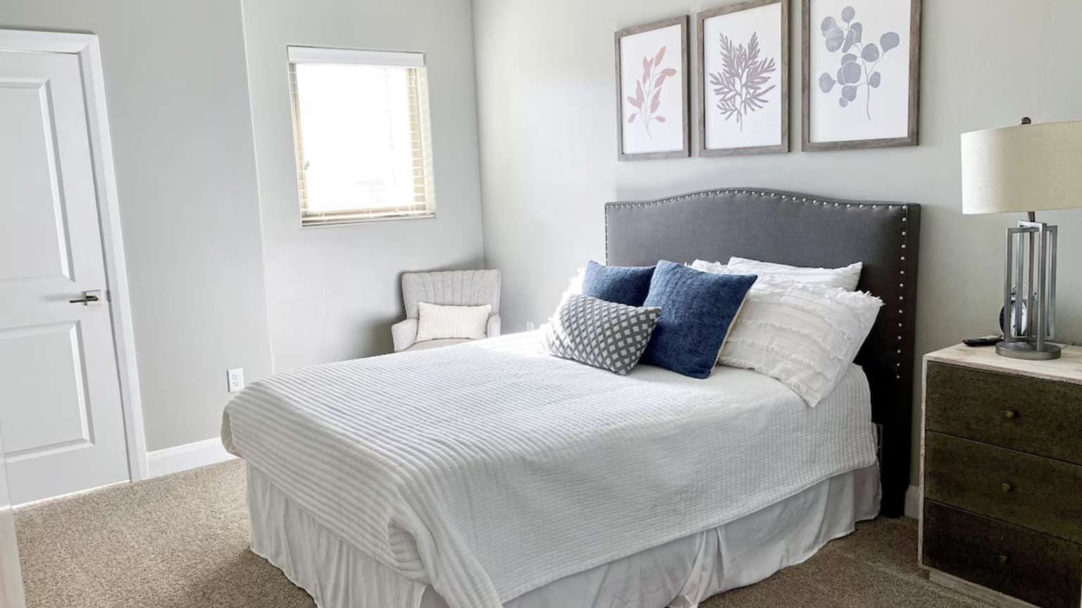 Carpeted bedroom with baseboards