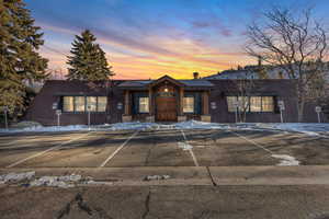 View of front of home with a chimney