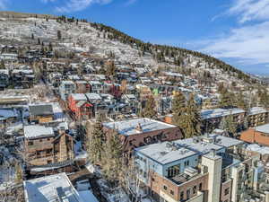 Snowy aerial view with a mountain view