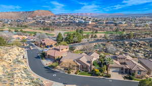 Aerial perspective of suburban area with mountain views and the golf course at St George Golf Club