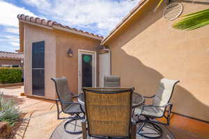 View of patio featuring outdoor dining area