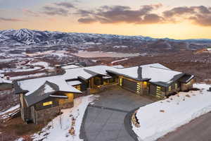 Snowy aerial view with a mountain view