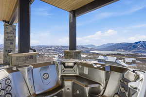Patio / terrace featuring a mountain view and area for grilling