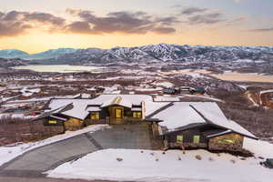 Snowy aerial view with a mountain view