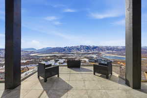 View of patio with a mountain view and an outdoor hangout area