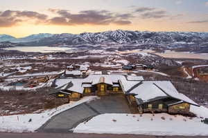 Snowy aerial view with a mountain view