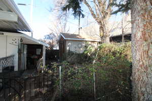 View of yard featuring a storage shed