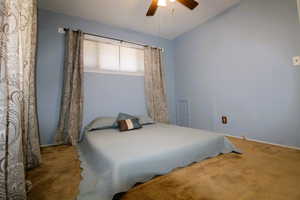Bedroom featuring carpet floors and a ceiling fan