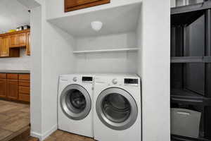 Laundry area featuring independent washer and dryer