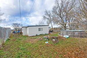 View of yard with an outdoor pool