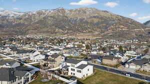 View of mountain background featuring nearby suburban area