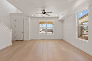 Unfurnished room featuring light wood-type flooring, recessed lighting, and a ceiling fan