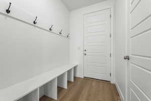 Mudroom with light wood-style flooring
