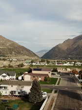 View of mountain backdrop with nearby suburban area
