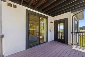Spacious exterior deck with wood-finish flooring